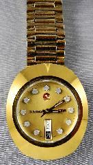 Seiko Transistor International clock 8 watch movements. Three Rolex spoons. Ladies Solix wristwatch. Bag of watch parts. Lot # 458 458 Ladies Rado Dia Star wrist watch. 459 Dutch style wall clock.