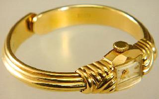 Lot # 496 496 Ladies 9 k gold cased wrist watch.