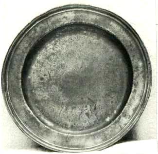 Item 431 A William III plate with multiple reeded narrow rim by John Trap of Worcester