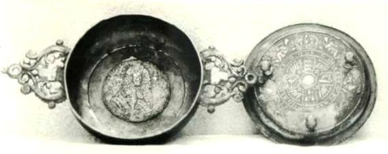 Item 445 A two eared royal porringer, the ears of dolphin type. On the back of our ear the touch of Samuel Lawrence c1690.