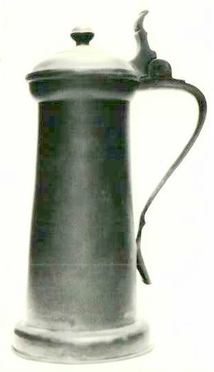 Item 453 A magnificent specimen of the tall Charles I bun lidded flagon, the height to lip 12 inch and overall 14 1/2 inch.