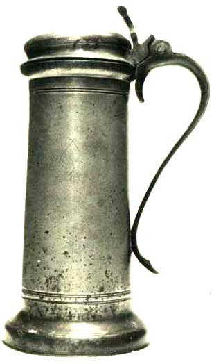 Item 458 A 17th century Charles 1st burn lid flagon height to lip 10 3/8 inch and overall 12 1/2 inch.