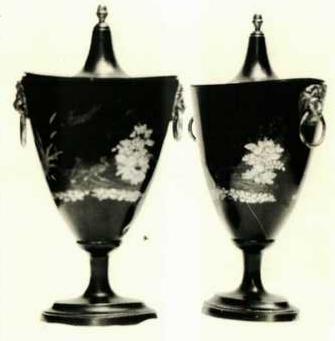Items 462-3 A pair of Dutch Pewter vases with separate oval light house covers. The oval body tapers into an oval foot.