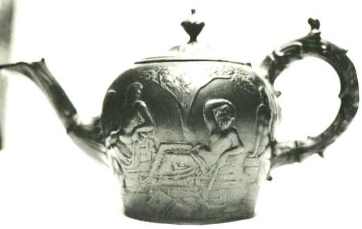 Item 470 The Portland Pewter teapot one of a limited number produced on the 18th century to mark the restoration of the original Wedgewood 'Portland' teapot broken by a visitor to the British Museum