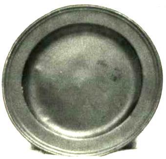 Item 484 A 9 1/2 diameter plate with a cast triple reeded rim.