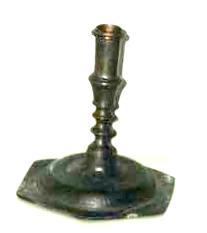 Item 498 A 17th century hexagonal based candlestick, height 5 1/2 inches with baluster stem.