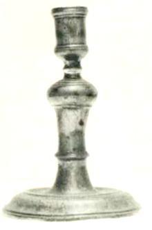 Item 499 A 17th century round based candlestick, height 6 3/8 inch, base 4 1/2 inch inside the base a