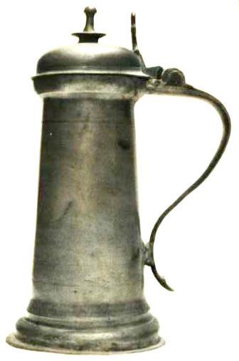 Item 522 An important 17th century flagon with traditional features of the James 1st and Charles 1st periods. To the lip 8 3/8/ inches, overall 11 inches.