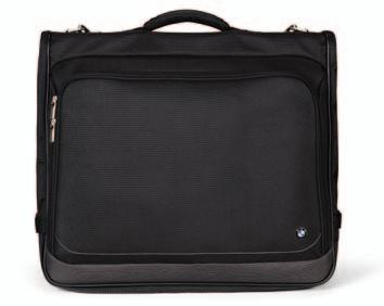 Finally you can travel in style, with this spacious travel bag made of water-repellent polyester. Large compartment with zip closure. Two elastic straps hold clothes or papers securely in place.