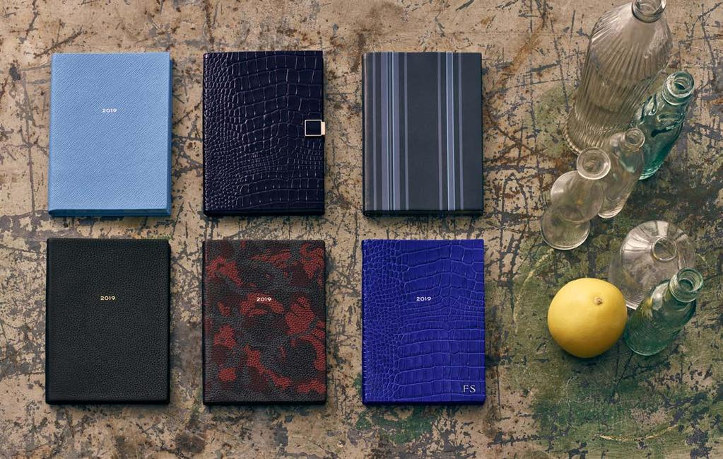 1 1...... Cross-grain leather in Nile Blue Crocodile print Mara leather in navy with enamelled slide Smooth Baltimora leather in navy stripe Soft Burlington leather in navy Soft Burlington leather in
