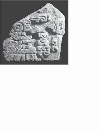 ³ 7 2 0 % Fragments of carved stone tablet and its hypothetical reconstruction carved stone tablet most likely corresponds to an offering placed in association with Lady 10 Naa s husband, Lord 1