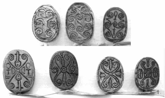 Spirals and cross patterns on scarabs (Egyptian Museum, Torino). Dating the scarabs is very difficult, because they were passing through many generations.