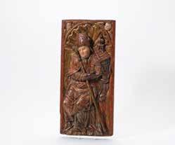 134 279 A Dutch carved oak panel depicting Hope Early 17th century A standing female personification of Spes, goddess of Hope, a falcon on her left hand, an anchor at her feet, surrounded by
