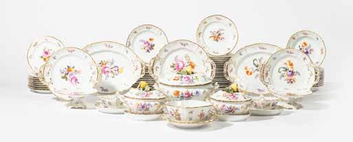 143 295 A Nymphenburg floral part dinner service 20th century, printed green and blue marks Decorated with flower bouquets surrounded by scattered flowers and gilt rims, comprising thirty-three