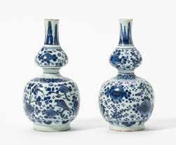 5 cm (2x) 323 Two Dutch Delft blue and white double-gourd vases and a jar The double-gourd vases marked PK for Pieter Gerritsz.