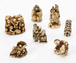 160 348 A collection of three Japanese netsuke 19th century One ivory netsuke carved as a child with a fruit figure, signed Ko Gyoku; one in ivory, carved as an insect on a piece of fruit, signed