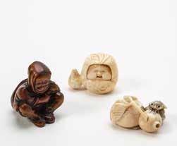 000 349 A collection of seven Japanese ivory netsuke Meiji period (1889-1912) and later Comprising of two figures fighting; two ladies with child; a child with mask; oni with a conch shell; a demon