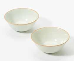 161 352 A pair of Chinese Qingbai bowls Song dynasty (960-1279) The bowls each raised on a short cylindrical foot and modelled with a slightly flared rim, covered overall in a delicate greyish white