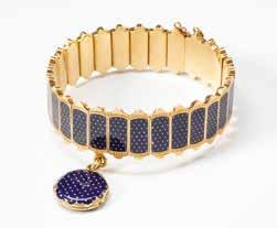 40 49 An 18 carat gold bracelet Circa 1970 Designed as three flexible satined bands to a gold clasp. Gross weight approx. 57 gr.