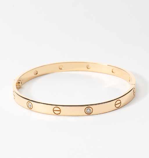 42 54 An 18 carat rose gold and diamond Cartier-style bangle 21st century The bracelet at intervals set with circular-cut diamonds, with