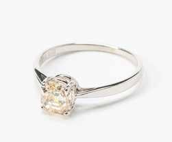 50 73 A 14 carat white gold and diamond ring Circa 1970 Centered by two larger circular-cut diamonds and various smaller circular-cut diamonds, the mount with single-cut diamond detail.