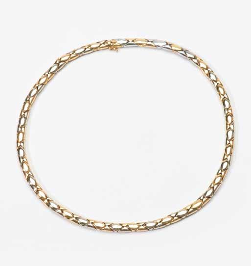 92 An 18 carat white and yellow gold Cartier necklace 20th century Designed as an entwined linked necklace, signed