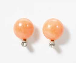 7 mm (coral) Measured and weighed in the mount 100 A pair of 14 carat white gold, fire opal and diamond earrings