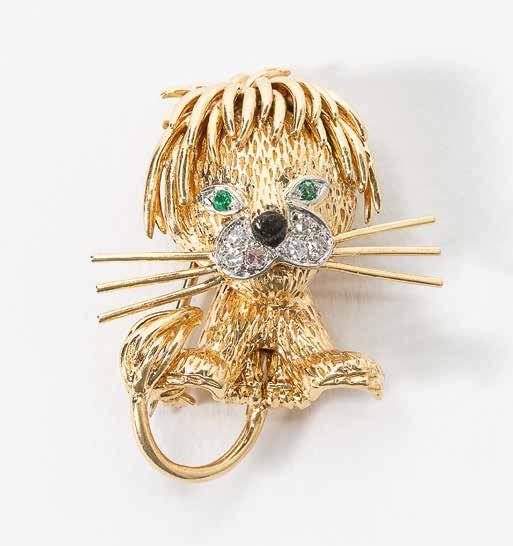 68 121 An 18 carat gold, diamond, emerald and enamel Van Cleef & Arpels novelty brooch Circa 1960 Designed as seated lion with single-cut diamond and emerald detail, the nose