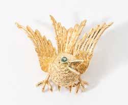 69 122 An 18 carat gold, diamond and emerald Hermès novelty brooch Circa 1960 Designed as a deer, with single- and circular-cut diamond and emerald detail, numbered 46066, signed Hermes Paris.