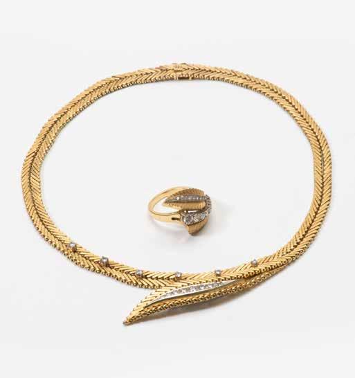 130 An 18 carat gold and diamond necklace and ring Circa 1950 Designed as a double linked yellow and white gold necklace with circular-cut diamond detail, ending in an asymmetrical circular-cut