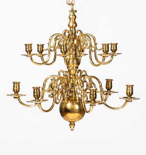185 A Dutch brass twelve-light chandelier 19th century With a ball and multi baluster stem and two tiers of