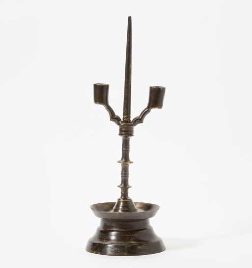 96 191 An exceptional Flemish brass epiphany candlestick 15th century With two candle holders mounted on a pointed stem with