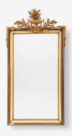 98 196 A giltwood Louis XVI-style mirror Late 19th century A carved central vase crest with flower bouquet, palm branches