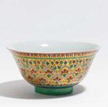 Porcelain, painted in famille rose and turquoise. H.23.5cm. Underneath a six-character Qianlong mark, but later. Condition A. 1.200 1.400 $ 1.392 1.