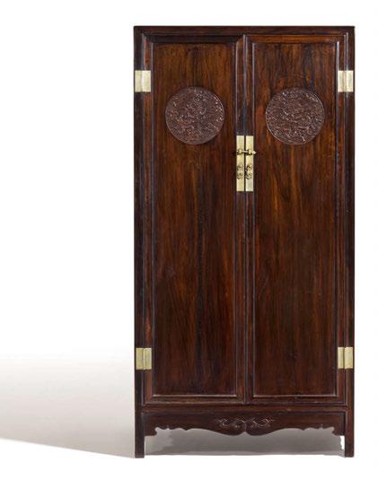 2119 A PAIR OF LARGE CABINETS WITH DRAGON MEDALLIONS. PAAR GROßE SCHRÄNKE MIT DRACHENMEDAILLONS. Asia. Dark hardwood. Hinges and locks made of bright Paktong bronze, finely engraved.