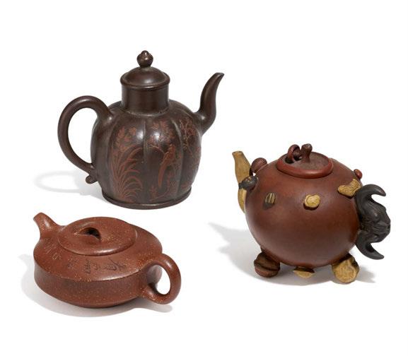 2005 TEAPOT WITH POEM AND LANDSCAPE. TEEKANNE MIT GEDICHT UND LANDSCHAFT. China. 20th c. Yixing stoneware of the red brown type zi sha with finely polished surface.