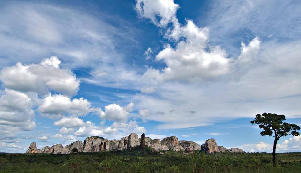 INSIDE ANGOLA The Black Rocks of Pungo Andongo Rising up majestically from the open plains below, the Black Rocks of Pungo Andongo known locally as the Pedras Negras de Pungo Andongo are one of the