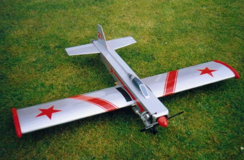 It looked decidedly primitive to me so I decided to have a go at designing a much more attractive model using this material. The result was a low wing sports model with a.40 ASP glow engine up front.