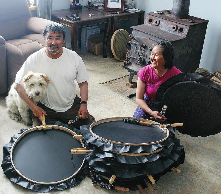 Ross and Lise Flowers with a stack of newly finished drums 2016 Each drum accumulates its story through the many hands it passes as it travels.