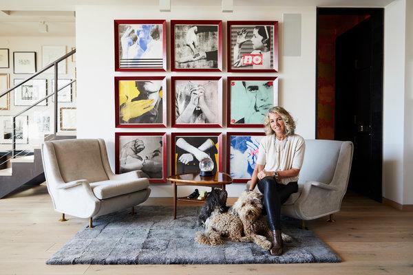 Empty Nesters Downsize, but There s Always Room for Art Stephanie Ingrassia with her dogs, Olive and Max, in front of Barbara Kruger s nine-part 1985 work We Will No Longer Be Seen and Not Heard, and