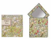 A dense and intricate floral pattern with lily flowers and country blooms intertwined with swaying briar leaves.