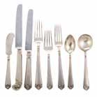 teaspoons, 10 solid butter spreaders, 3 serving spoons, 2 ladles, 2-pc solid salad set, 2-pc carving set, olive fork, and sugar spoon, no monograms, 11370 ozt weighable Est $1,500-2,000 440 Set of