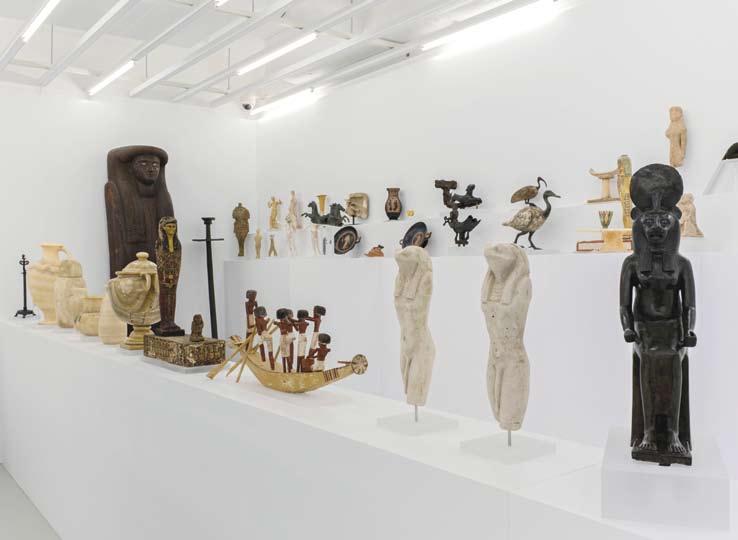 1 jean Claude Gandur photographed with his collection in Geneva in December 2012 Photo: Claudio Bader 2 View of a selection of M. Gandur s antiquities, arranged on a stepped display.