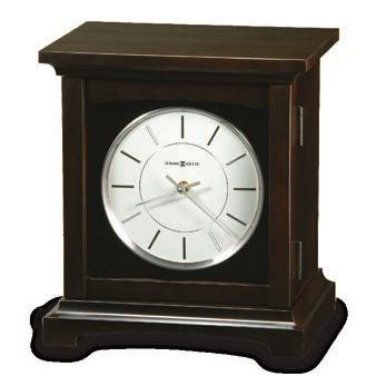 5"h (internal) Hardwood construction with dark stain and satin finish Howard Miller quartz movement clock Chiming mechanism with