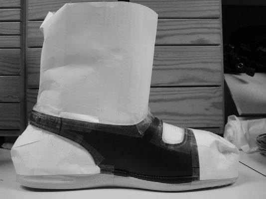 Testing of cold protective footwear 65 Fig. 2. Footwear S with openings covered. Fig. 3. Placement of the sensors (footwear H). area where the sole contacts the support platen (Fig.