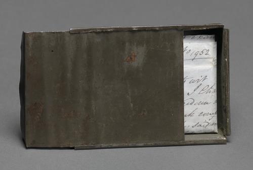 I may also see the freedom papers and handmade tin carrying box belonging to Joseph Trammell.