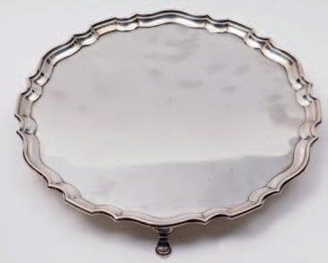 diameter, maker HEB, FEB, Chester 1917, 19.06ozs. 7. An Edwardian basket of cartouche outline, with pierced border and embossed floral decoration, 32cm. wide, maker S.G, Birmingham, 1905, 9.16ozs.