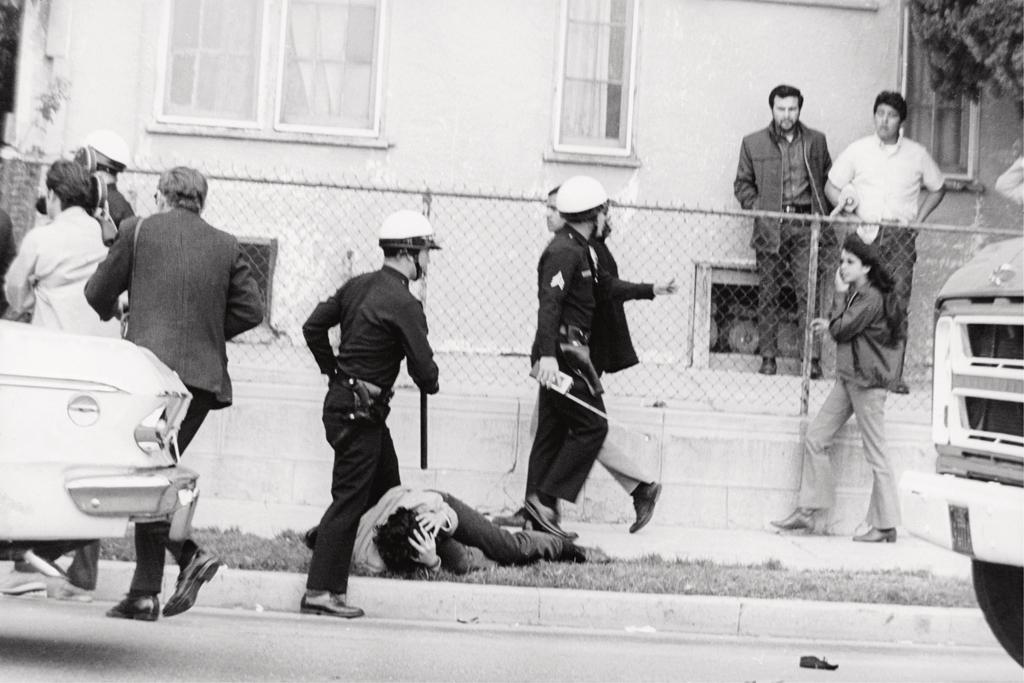 George Rodriguez, Boyle Heights, 1968. Some kid got hit on the head by the cops during the Walkouts. I called these images a field day for the heat. They were just kids.