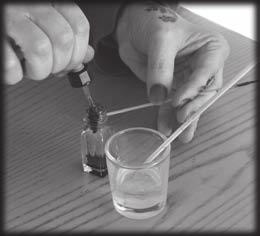 5 When the fragments of stone are ground into a fine powder, put the powder into the mixing container, a cup or small bottle. Warm water up (approximately 1/3 of a shot glass or 10-12 ml.