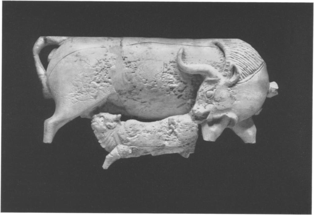Fig. 22. Ivory cow and calf in high relief.